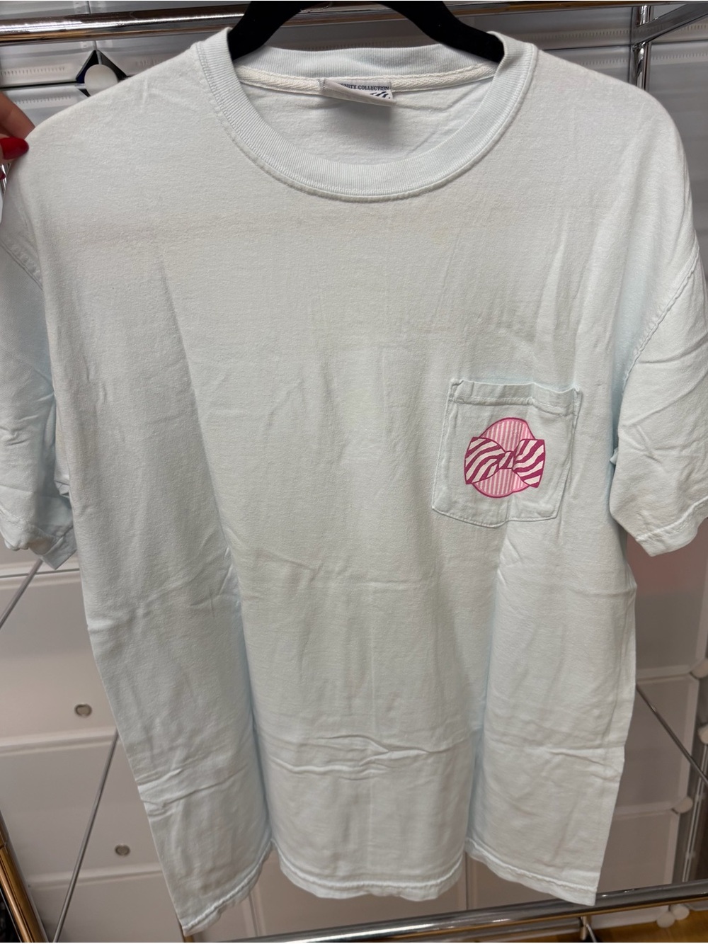 Fraternity Collection Light Blue Short Sleeve Tee with Pink Bow Pocket Graphic